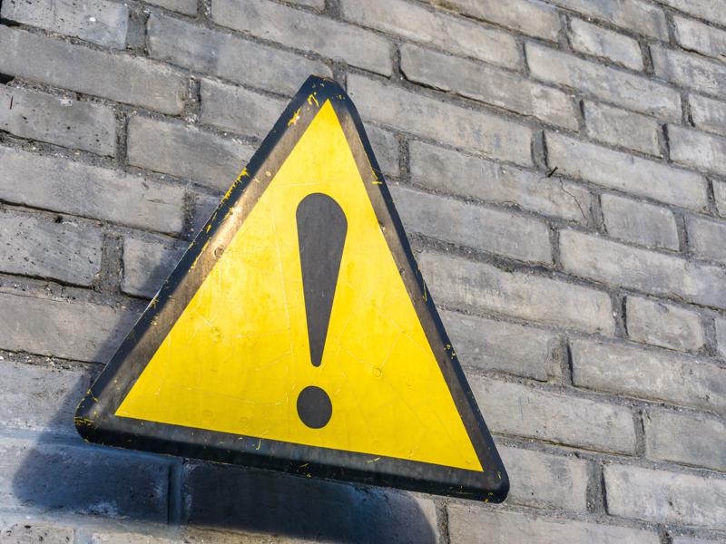 yellow caution sign