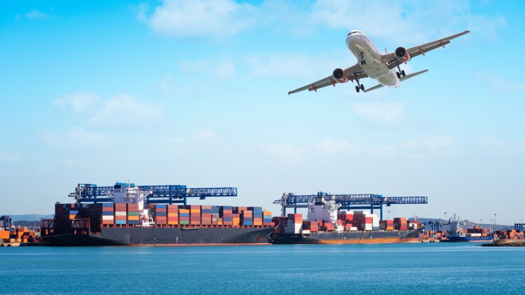 Container cargo freight ships with working crane loading bridge in shipyard, and cargo plane in front of the harbor, for logistic Import export background