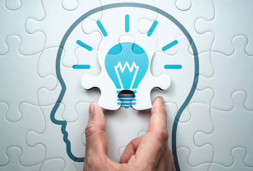 Getting knowledge and solving problem. Logical idea concept.  Connecting last jigsaw puzzle piece.