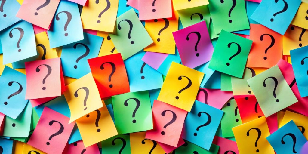 a log of colorful question marks